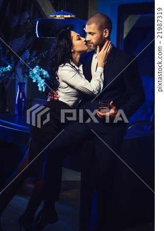 Couple indoors. Office romance concept Couple indoors. Office romance concept 21987319