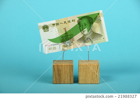 Chinese yuan growth illustrated over blue Chinese yuan growth illustrated over blue 21988327