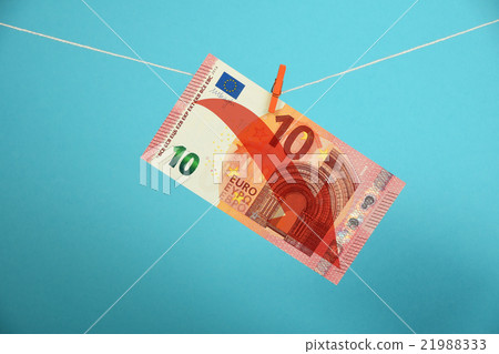 Euro decline illustrated over blue 21988333