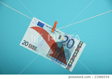 Euro decline illustrated over blue Euro decline illustrated over blue 21988334