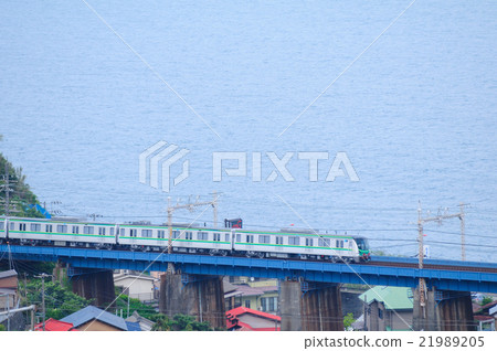 Tokyo Metro 16000 series train crossing the iron bridge overlooking Sagami Bay 21989205
