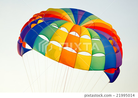 the colorful stripes of parachute in the sky 21995014