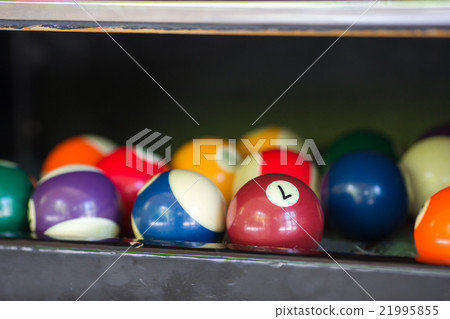 Billiard balls in a pool table Billiard balls in a pool table 21995855