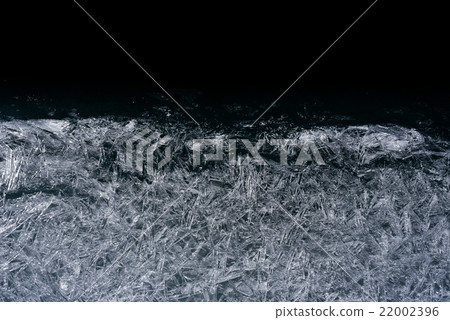 The ice cracked on a lake. 22002396