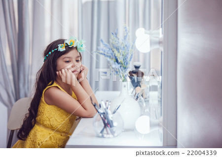 Little girls in beautiful dresses at the mirror 22004339