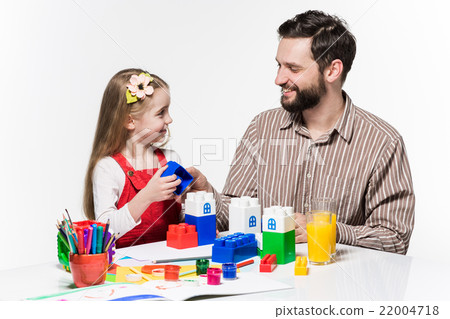 Father and daughter playing educational games Father and daughter playing educational games 22004718