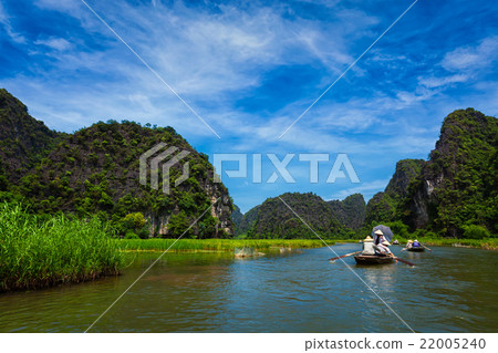 Tourists on boats in Vietnam Tourists on boats in Vietnam 22005240