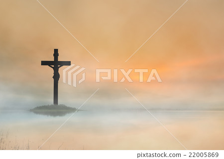 Silhouette Jesus and the cross in mist on mountain Silhouette Jesus and the cross in mist on mountain 22005869
