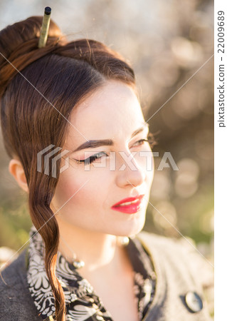 Beautiful young woman with japanese style make-up Beautiful young woman with japanese style make-up 22009689