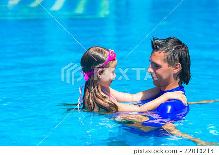 Happy active family, young dad and little daughter Happy active family, young dad and little daughter 22010213