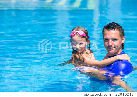 Happy active family, young dad and little daughter Happy active family, young dad and little daughter 22010215