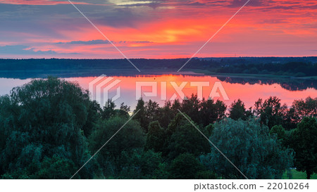 Beautiful sunset over the lake 22010264