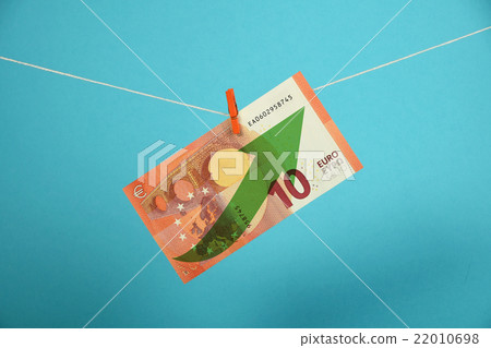 Euro currency growth illustrated over blue Euro currency growth illustrated over blue 22010698