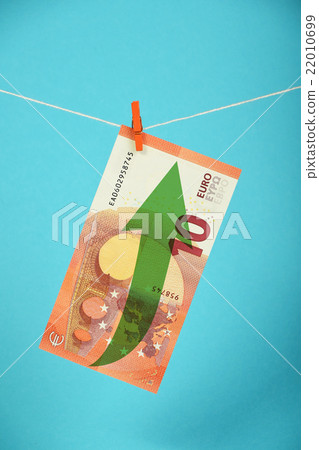 Euro currency growth illustrated over blue Euro currency growth illustrated over blue 22010699