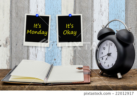 It's Monday ,It's Okay on paper note at wood wall 22012917