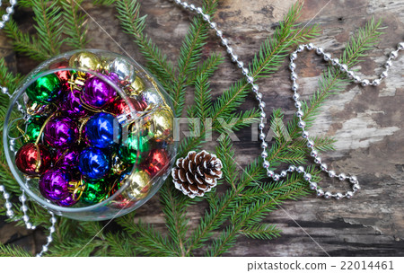 Colorful Christmas balls on wooden background Colorful Christmas balls on wooden background 22014461