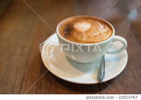Hot coffee in white cup and saucer 22014767