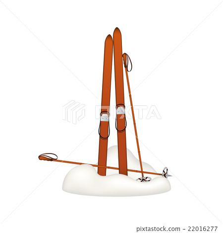 Old wooden alpine skis and old ski poles in snow 22016277