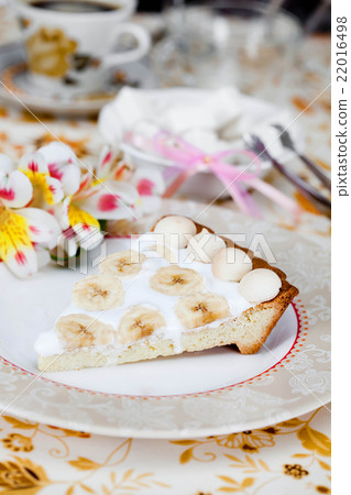 white banana cake on a plate 22016498
