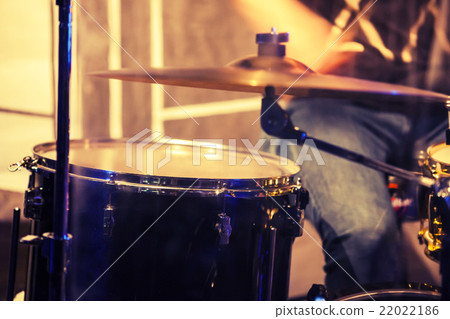 Blurred photo background, drummer on a stage 22022186