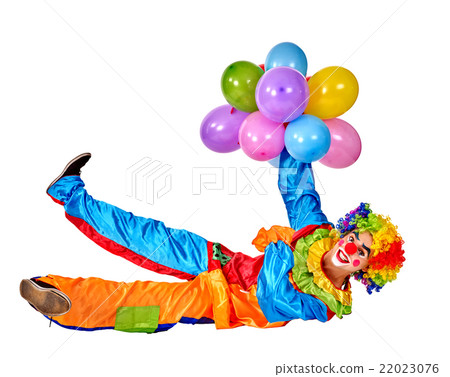 Happy birthday clown holding a bunch of balloons 22023076