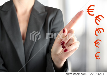 Businesswoman touching  euro by finger 22023211