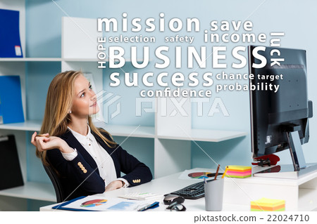 Young business woman looking on word's cloud Young business woman looking on word's cloud 22024710