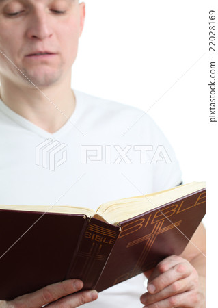 Man reading the Bible Man reading the Bible 22028169