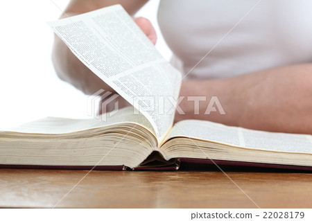Man turning the page of the Bible Man turning the page of the Bible 22028179