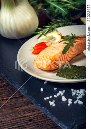 grilled Salmon with lemon, herbs and pesto 22028475