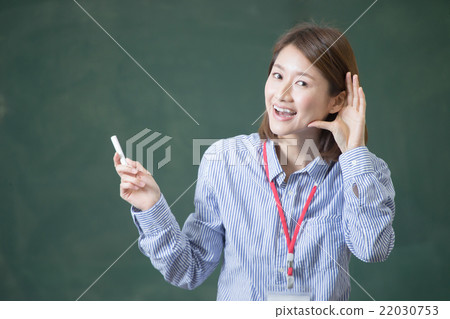 Female teacher / blackboard 22030753