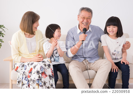 Senior couple and granddaughter (karaoke) Senior couple and granddaughter (karaoke) 22030958