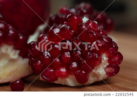 Several pieces of juicy pomegranate Several pieces of juicy pomegranate 22032545