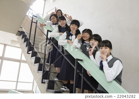 Students sitting on the stairs 22043282