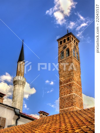 Clock tower and Gazi Husrev-beg Mosque in Sarajevo Clock tower and Gazi Husrev-beg Mosque in Sarajevo 22043537