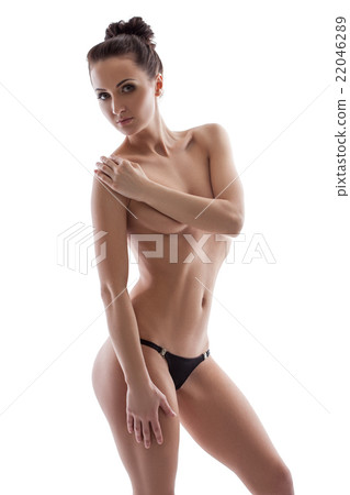 Bodycare. Beautiful girl posing topless at camera Bodycare. Beautiful girl posing topless at camera 22046289