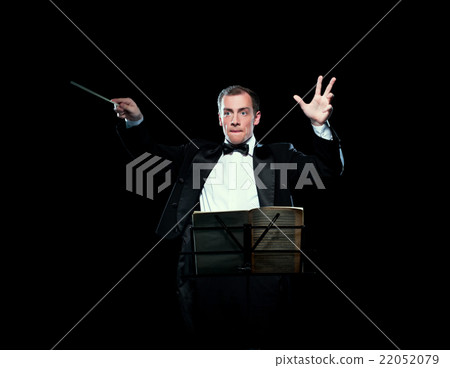 Shot of music director conducting with inspiration 22052079