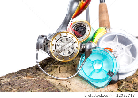 fishing tackles and fishing baits on wooden 22053718
