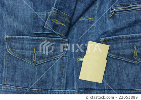 Blue jean shirt with empty tag for background. Blue jean shirt with empty tag for background. 22053889