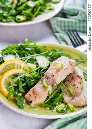 Steamed catfish filet with arugula salad Steamed catfish filet with arugula salad 22056017