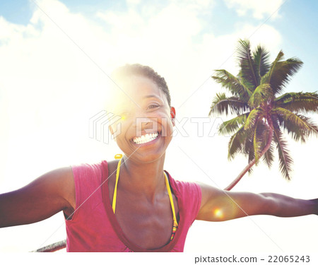 Young woman relaxing on a tropical beach Concept 22065243