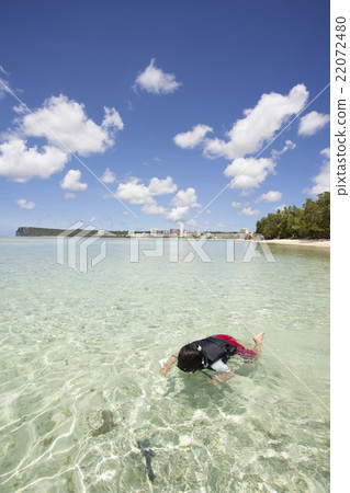 A boy snorkeling A boy snorkeling 22072480