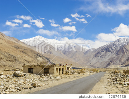 Road on plains in Himalayas with mountains Road on plains in Himalayas with mountains 22074586