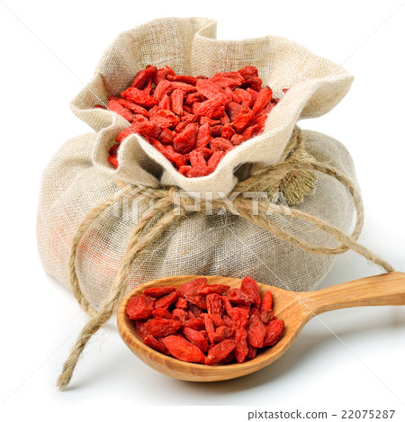 Goji berries insack bag with wooden spoon isolated Goji berries insack bag with wooden spoon isolated 22075287