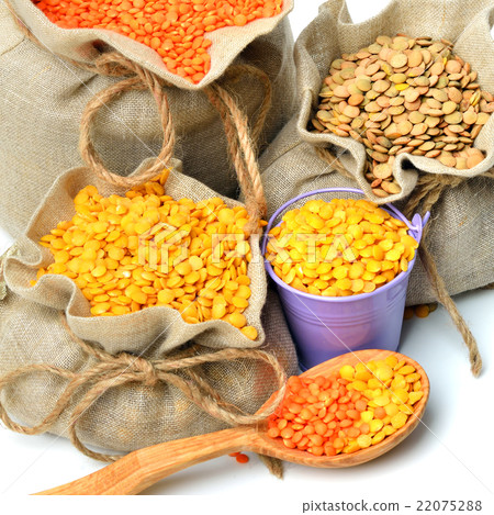 lentils in the sacks and spoon wooden lentils in the sacks and spoon wooden 22075288