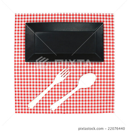 Top view plate and spoon, fork on red tablecloth Top view plate and spoon, fork on red tablecloth 22076440