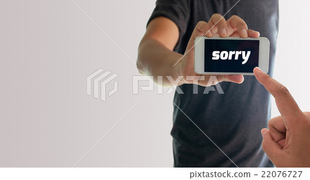 a man using hand holding the smartphone a man using hand holding the smartphone 22076727