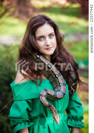 Attracrive girl with snake Attracrive girl with snake 22077442