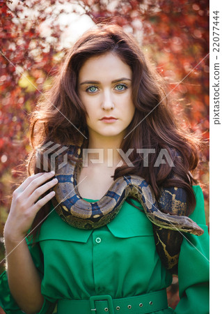 Attracrive girl with snake Attracrive girl with snake 22077444