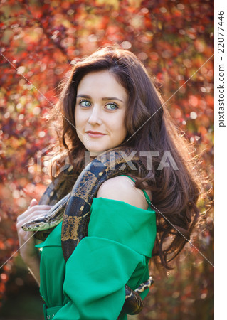 Attracrive girl with snake 22077446